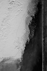 Abstract ice and snow on the river texture; winter; footsteps on the snow