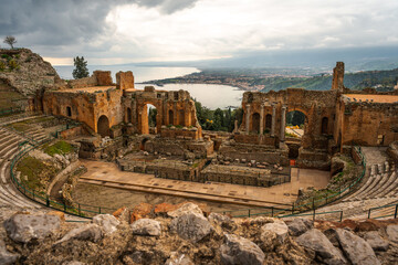 Ancient Greek Theater in Taormina, Sicily, Italy. Famous tourist attraction and travel destination