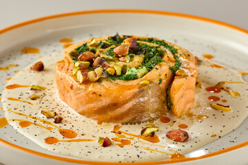Exquisite Salmon Roulade with Spinach and Pistachios on Creamy Sauce