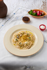 Gourmet Mushroom Dumplings in Cream Sauce - Evocative Rustic Elegance