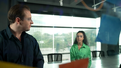 Professional business people discuss about creative marketing idea in modern office. Business team...