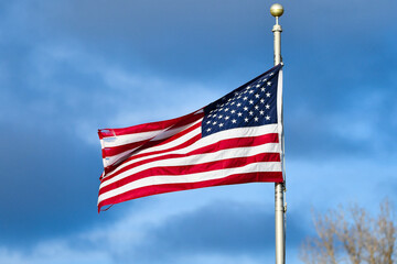 american flag and blue sky