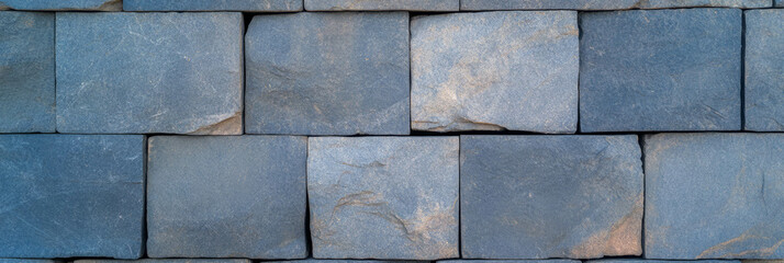 Fototapeta premium Asymmetric square grid texture on uneven stone surface for architectural design