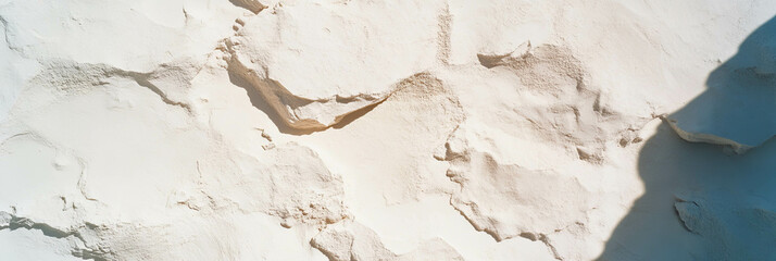 Fototapeta premium Natural beige wall texture with grainy surface for design and decor