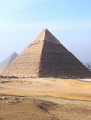 Majestic pyramids of Giza under a clear blue sky in Egypt highlighting ancient architecture and desert landscape offering a timeless travel destination