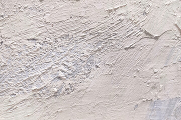 Rough large light brushstrokes of oil paint on canvas. Artistic vintage background