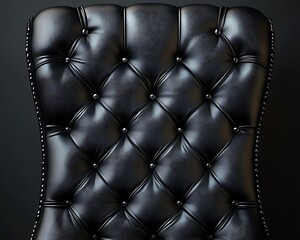 Black leather chair back, tufted, dark background, interior design