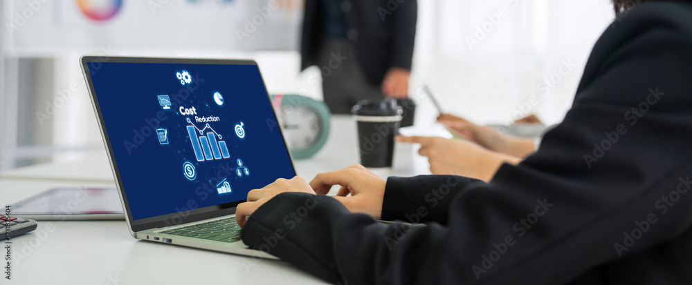 Poster cost reduction, cost saving concept shown on computer screen brisk, corporate business efficiently s