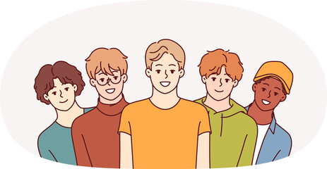 Group of high school guys smile and look at screen, for concept of multi-ethnic society. Positive teenage boys in casual clothes offer to join youth community or become member of university fraternity