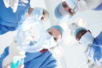 Doctors, oxygen and mask in surgery in theatre of anaesthesia safety, emergency procedure and ppe. Below, tools and gas for sleeping, operation gear and medical treatment of healthcare service