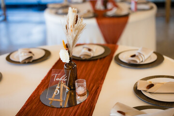 wedding decorations and table decor from a tan wedding
