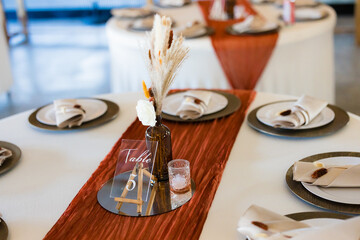 wedding decorations and table decor from a tan wedding