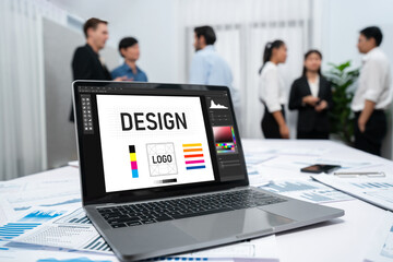 Graphic designer software for modern design of web page and commercial brisk ads showing on the...