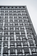A SnowCovered Modern Roof An Exceptional Architectural Feature Set Against a Stunning Winter...