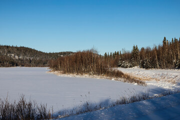 Bolio Lake in Alaska on a sunny winter day.