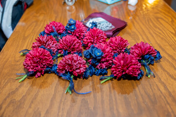 boutonniere for the guys at a local wedding