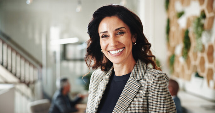 Portrait, manager and happy business woman in office as sustainability specialist. Boss, leadership and professional worker in enterprise, eco consultant and environmental policy advisor coworking