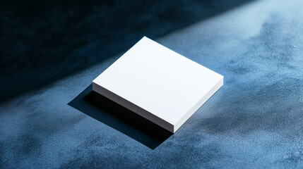 Minimalist business card presentation on elegant table with velvet backdrop