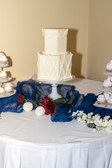 cake and flower decor at a wedding