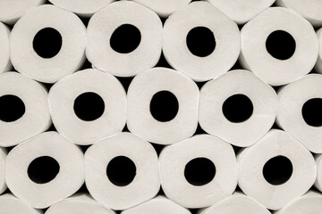 A stack of white toilet paper rolls as background texture