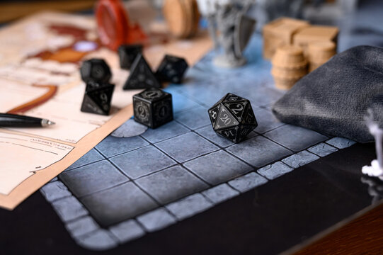  Black Dice set for RPG, DND or board games. Polyhedral dice (d4, d6, d8, d10, d12 and d20) for fantasy games. Dice on the game map.