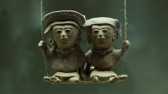 Olmec stone sculpture, depicting intricate symbols and sacred images of the Mesoamerican civilization.