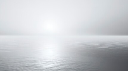 Fototapeta premium Soft grey and white blurred gradient with glowing light, creating a calm and peaceful atmosphere