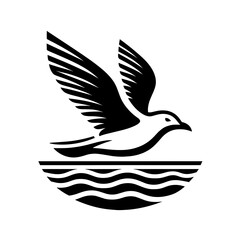 Obraz premium Seagull silhouette flying over the sea