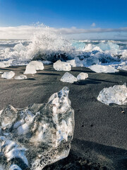 Glacier ice on the black sand at Diamond Beach, Iceland