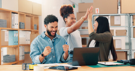 High five, laptop and logistics with distribution team in office together for celebration of deal or delivery. Computer, fist pump and success with supply chain people in workplace for achievement