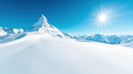 A grand expanse of snow-covered terrain, framed by a magnificent mountain, offering a pristine winter landscape that invites exploration and reflection.