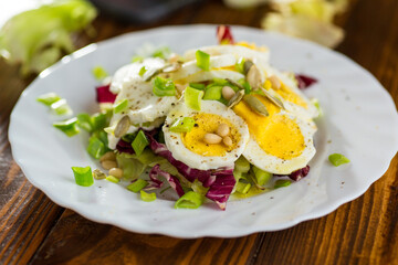 Healthy food on a plate in a plate on a wooden table