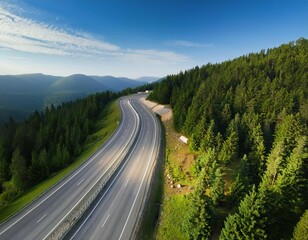aerial view of a road in the middle of the forest road curve construction up to mountain