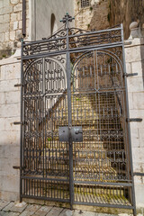 stone wall with ancient wooden door