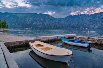  boats in the sea at sunset