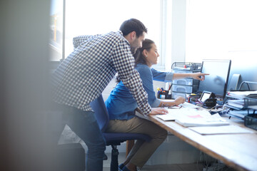 Computer, pointing and people with project, office and asking for feedback, intern and web...