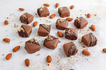 Handmade chocolate with pistachios, dark and milk chocolate pieces.