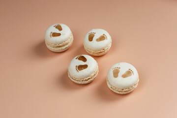 Colorful french dessert macarons with fresh fruits and nuts.