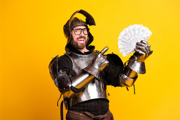 Funky knight in shining armor holding cash against a bright yellow background, embodying historical...