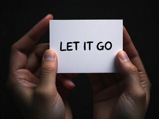 Hands Holding \"Let It Go\" Card - Motivational Image