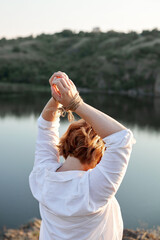 Woman's hands tied with rope
