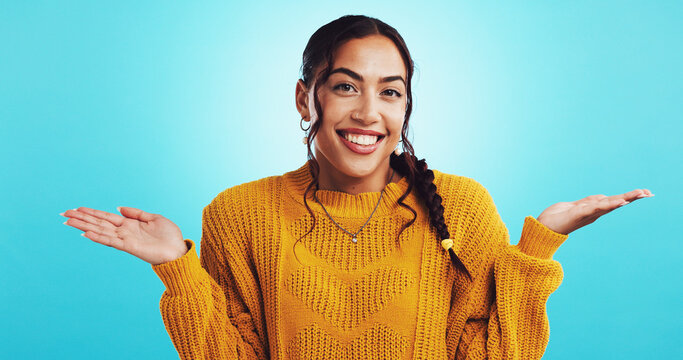 Choice, hands and woman with options, portrait and comparison for decision, studio and gesture. Blue background, pros and weighing of cons for person, selection and girl with expression for offer