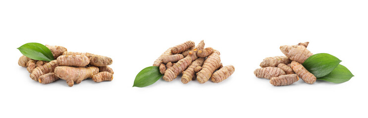 Turmeric roots and green leaves isolated on white, set