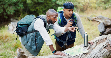 Men, talking and maps for hiking outdoor of trekking directions, forest navigation and direction....