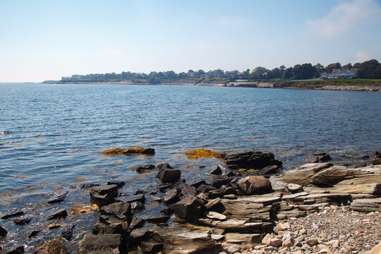 Rocky beach at the Cliff walk at the shore of the Easton bay in Newport, Rhode Island, USA
