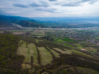 Obraz premium View of mountain valley and hills, aerial view, horizontal movement