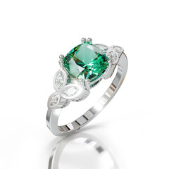 Exquisite white gold ring with a rich green emerald, set with marquise and round diamonds for a sophisticated, vintage appeal.