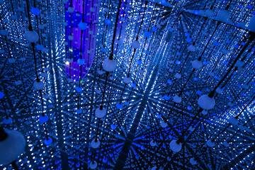 Many bright spotlights pattern in an abstract scene blue colored