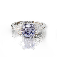 Captivating white gold ring with a deep purple amethyst, elegantly set with marquise and round diamonds. Perfect for artistic jewelry lovers.