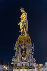 Prague, Capital City of Prague - Czech Republic. Aged bronze statue of Karl IV stands as a...